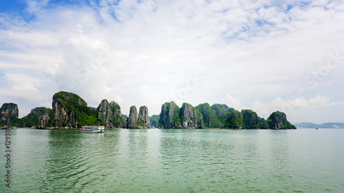 Tourist junks floating among at Halong bay, Vietnam