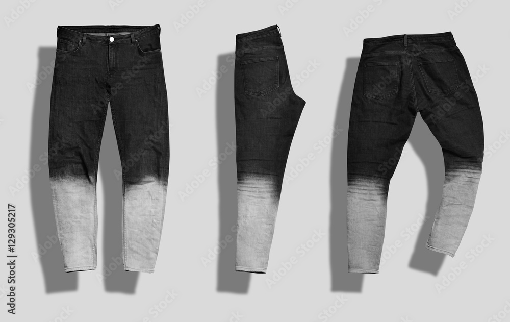 Pair of straight men's jeans with black to white gradient color shot from  the front and the back and folded in half isolated on white. Stock Photo |  Adobe Stock