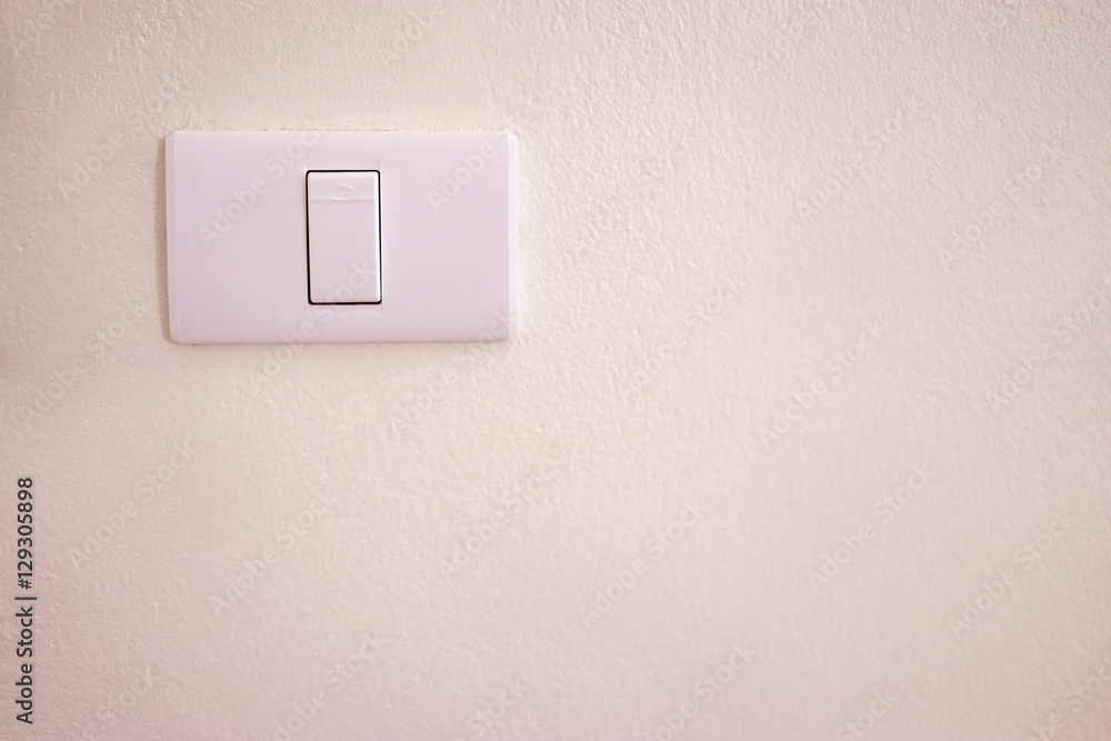 Interior detail. Switch button on the wall. Interior detail. Switch button on the wall.