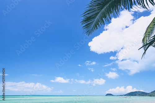 Beautiful tropical seascape with copy space on blue sky.