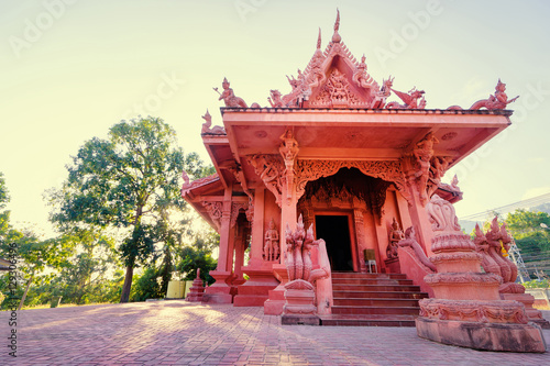 Architecture and religion. Red buddhism temle on Samui Island, Thailand. photo