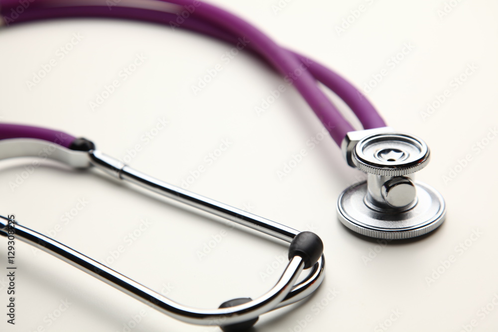 Closeup of a medical stethoscope, isolated on white background Closeup of a medical stethoscope, isolated on white background