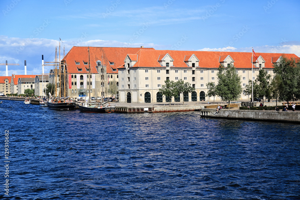 Copenhagen canal with boats and buildings in the city center
