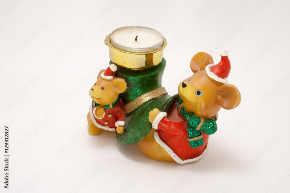 ceramic candle holder Christmas bears with a wax candle isolated on white background
