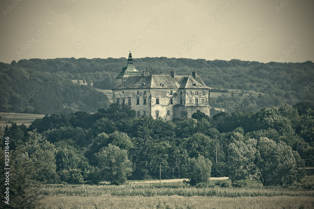 Olesko castle of the 14th century in Ukraine. Toning in retro style