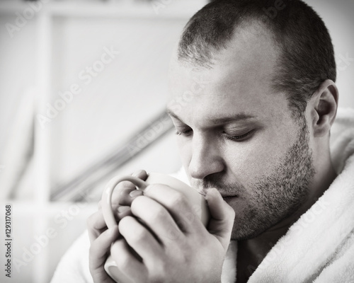 frozen man with tea cup