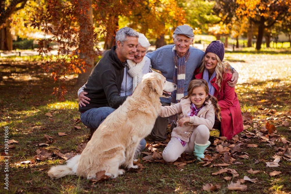 Smiling family with their dog Smiling family with their dog