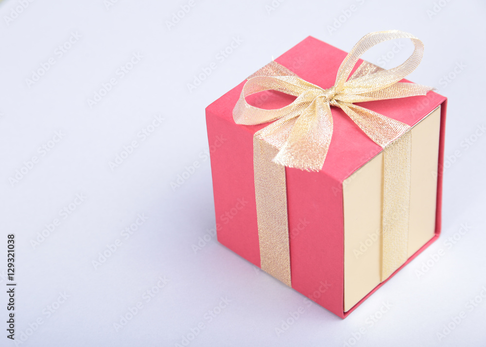 Obraz premium Gift boxes with bow on wood background