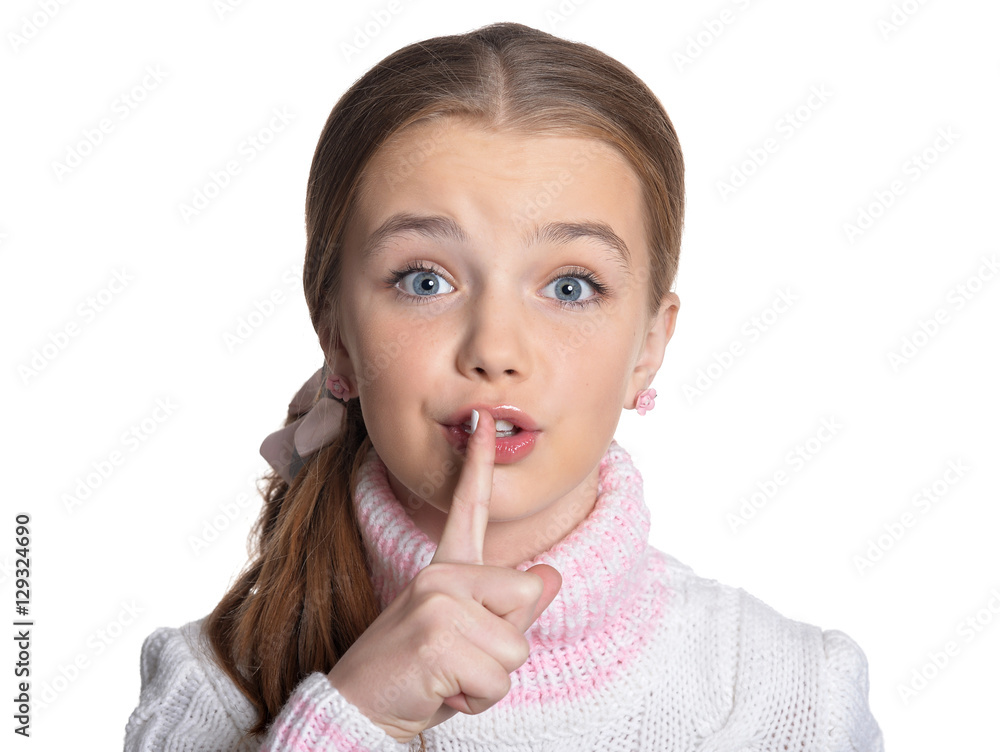 Little girl showing hush sign