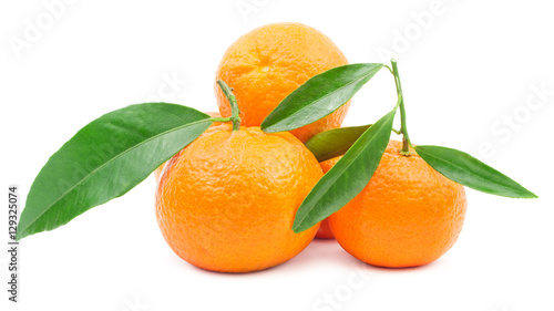Pile of mandarins with leaf isolated on white