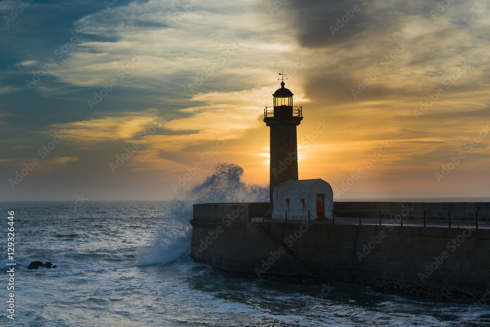 Lighthouse in mouth of Douro river, Porto, Portugal.