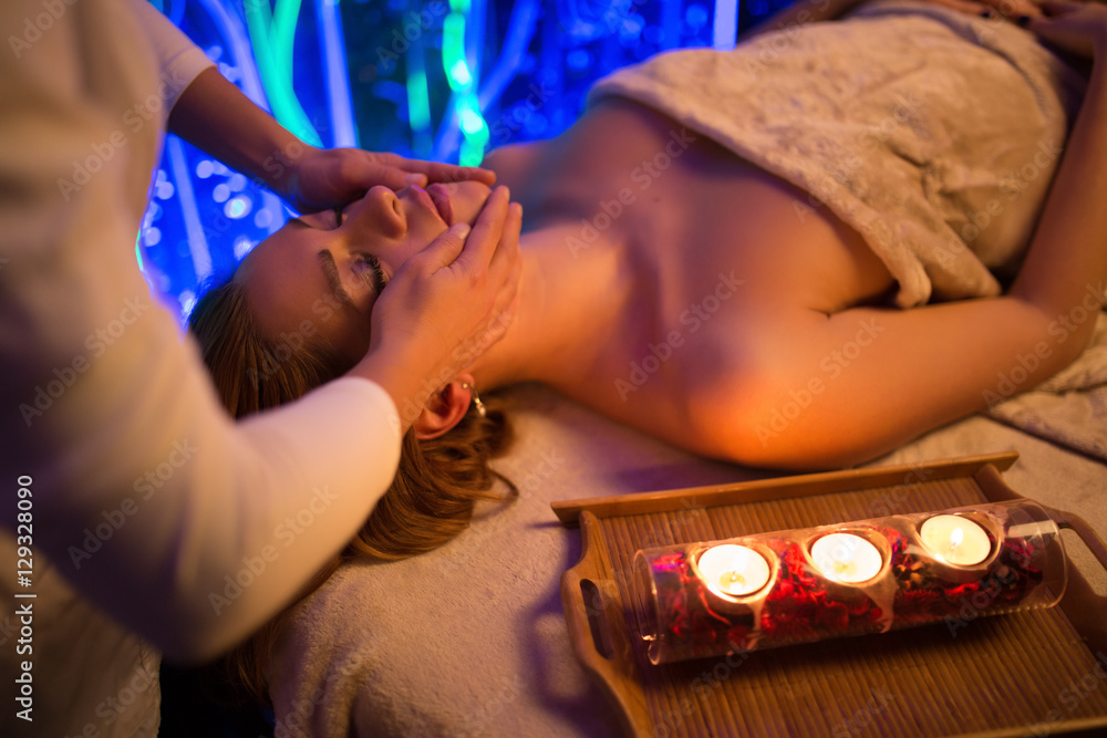 Beautiful relaxed spa procedure by candle light Beautiful relaxed spa procedure by candle light