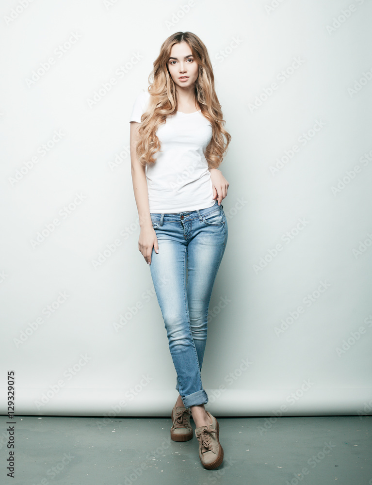 lifestyle, fashion and people concept: Full body young fashion woman model  posing in studio Stock Photo