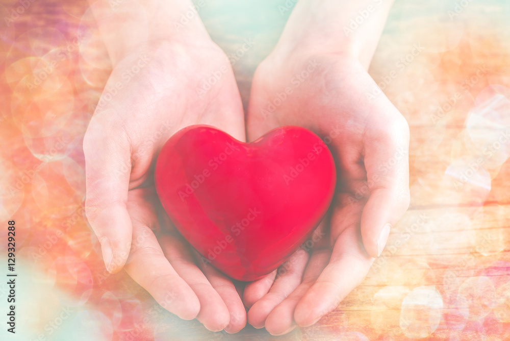 Obraz premium with heart in hands
