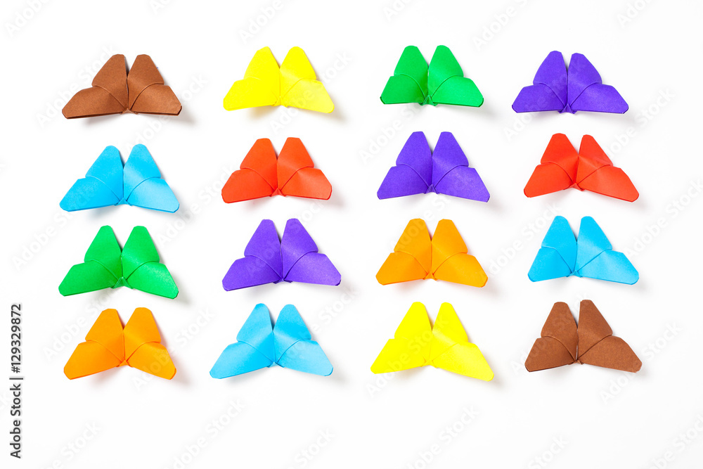 © captainweeraphan - Origami butterfly on white background. © captainweeraphan - Origami butterfly on white background.