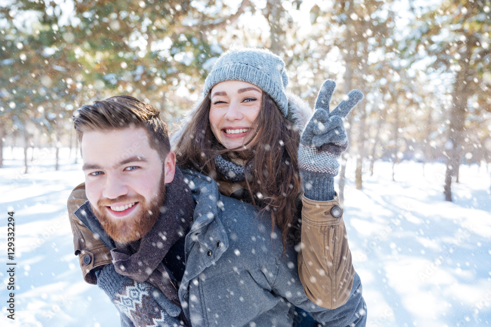 Fototapeta premium Happy couple walking in winter park