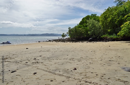 The volcanic Playa Sombrero Obscuro beach in Peninsula Papagayo in Guanacaste, Costa Rica photo