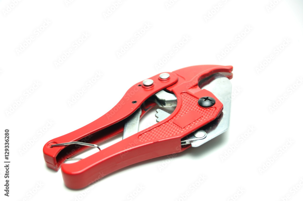 PVC pipe cutting pliers on white background. PVC pipe cutting pliers on white background.