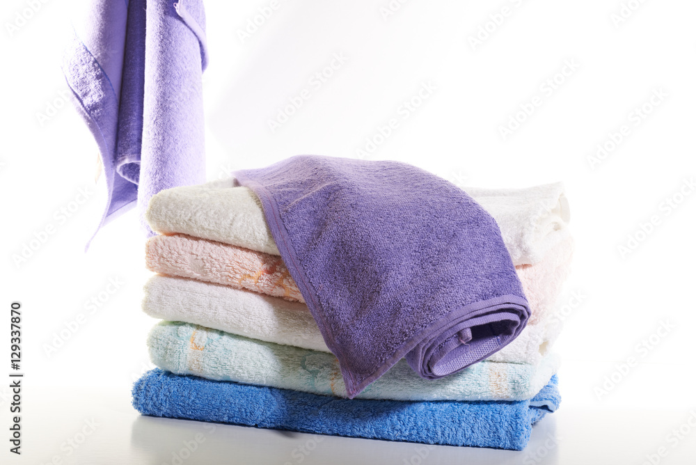 stack of towels on a white background Stock Photo | Adobe Stock