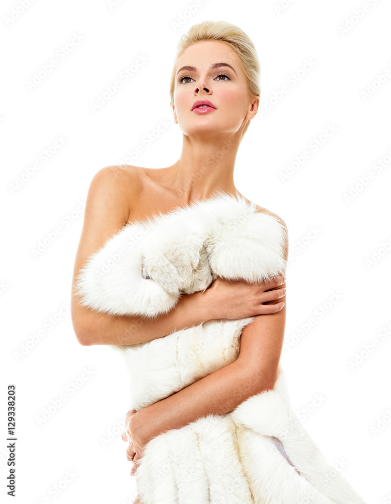Beautiful girl in a fur coat. Beauty Fashion Model Girl. Luxury Beautiful girl in a fur coat. Beauty Fashion Model Girl. Luxury