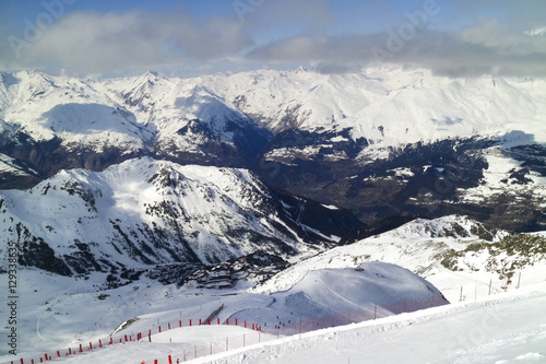 Paradiski ski area with marked pistes in Les Arcs winter resort, French Alps