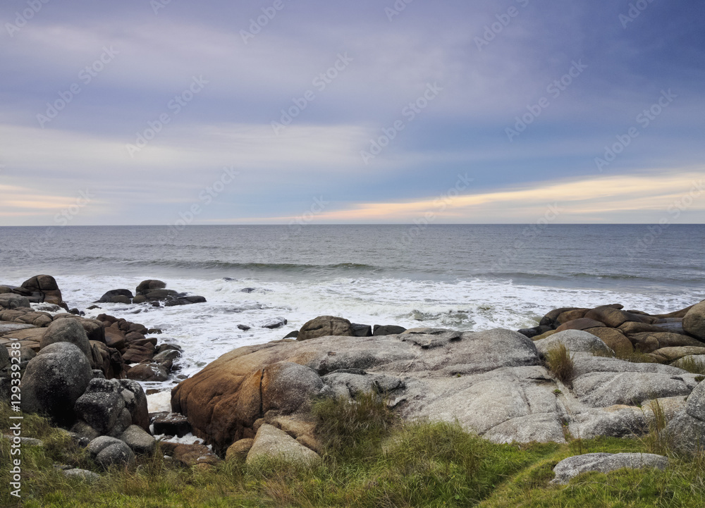 Uruguay, Rocha Department, Punta del Diablo, Rocky coast to the north of the village.