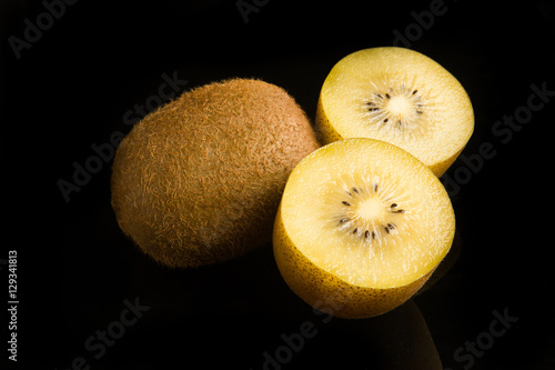 Kiwi  ftuit on the black background. photo