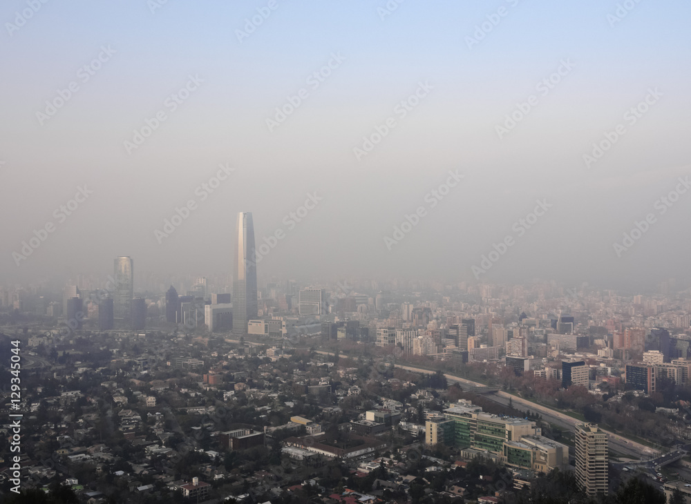 Chile, Santiago, View from the Parque Metropolitano towards the high raised buildings with Costanera Center Tower, the tallest building in South America. Heavy smog over the city.