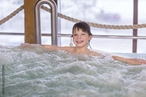 Child boy relax in a bath