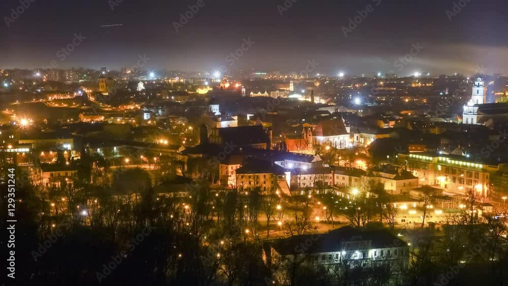 Vilnius, Lithuania cityscape night time lapse paning left to right Vilnius, Lithuania cityscape night time lapse paning left to right