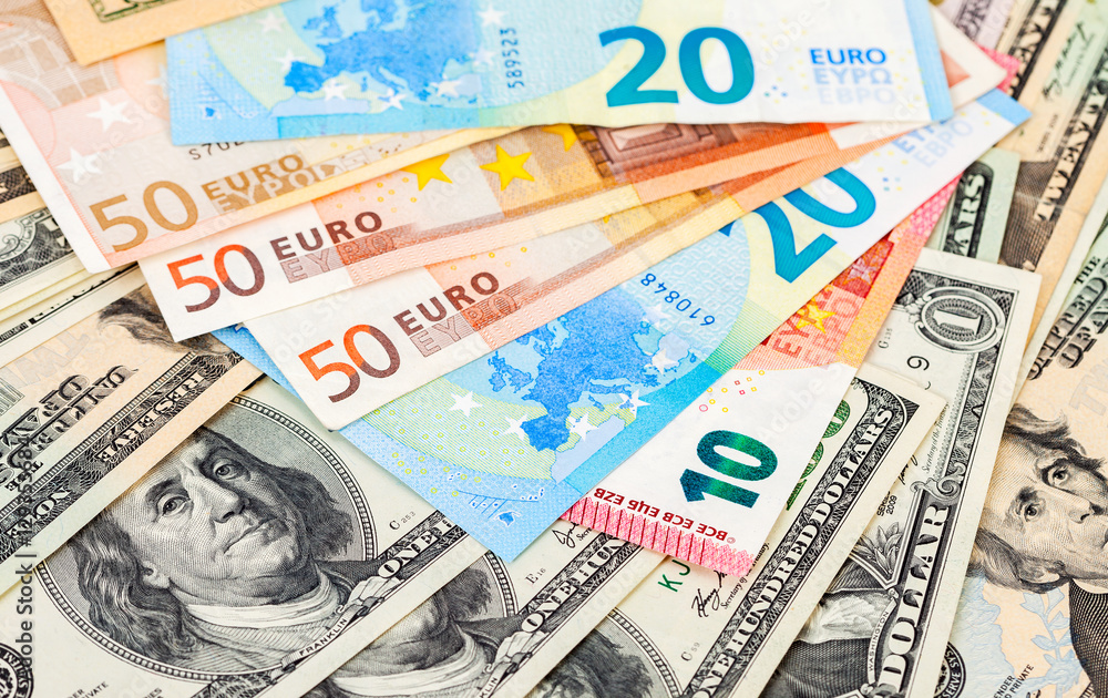 Obraz premium Money background from euro banknotes and american dollars