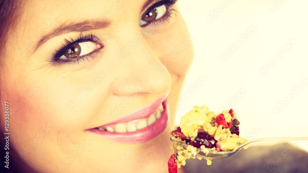 Woman eat oatmeal with dry fruits. Dieting Woman eat oatmeal with dry fruits. Dieting