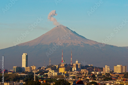 Popocatepetl Volcano over the town of Puebla, Mexico