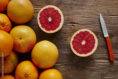 fresh organic grapefruit sliced with orange knife