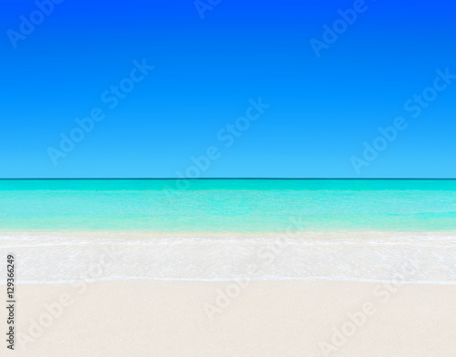 Tropical white sandy beach and clear ocean water natural background
