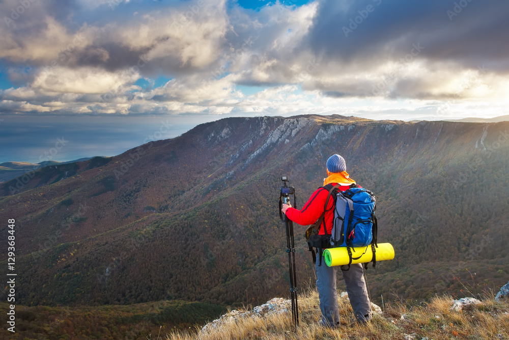 Nature photographer takes photos on mountain Nature photographer takes photos on mountain