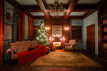 Calm image of interior Classic New Year Tree decorated in a room with fireplace