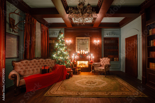 Calm image of interior Classic New Year Tree decorated in a room with fireplace