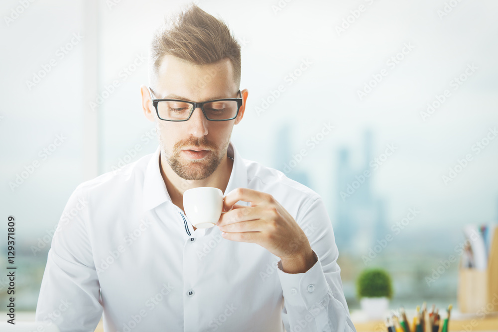 Handsome man with coffee cup Handsome man with coffee cup
