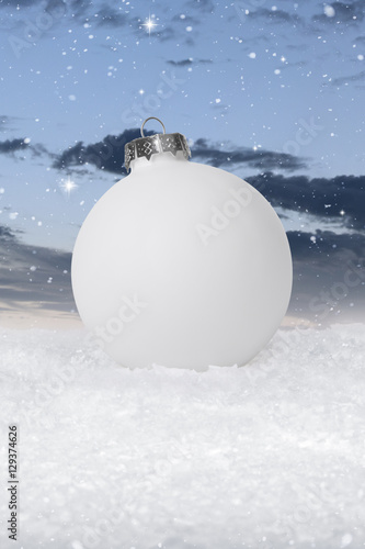 Plain White Christmas Bauble on a fake snow background