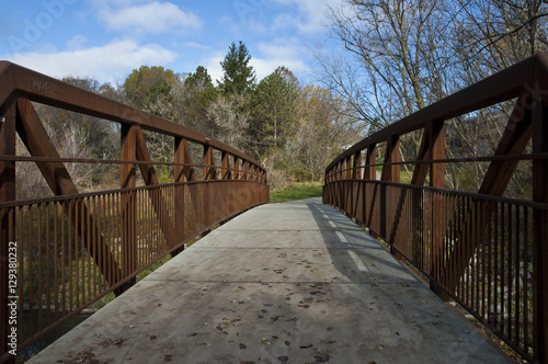 Iron and concrete bridge over the creek