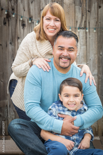 Happy Young Mixed Race Fami...