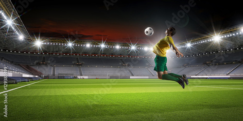 Soccer player kicking ball . Mixed media © Sergey Nivens