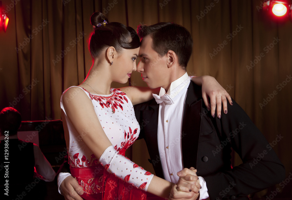 Beautiful couple in the active ballroom dance Beautiful couple in the active ballroom dance