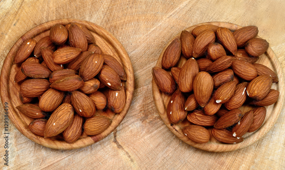 almond in dish on table almond in dish on table