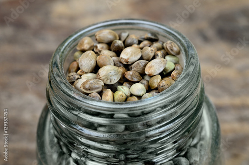 hemp seed in jar on table