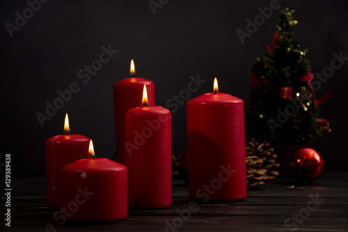 Red candles and christmas tree