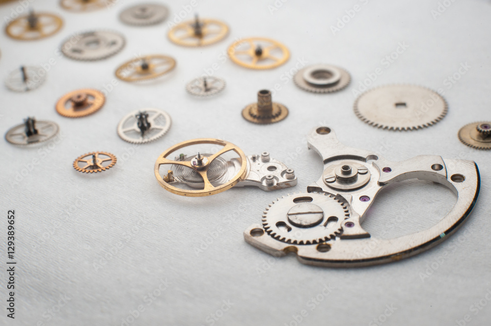 Detail of watch machinery on the table. Detail of watch machinery on the table.