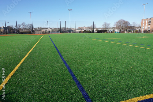 sport field in residential area with artificial green grass
