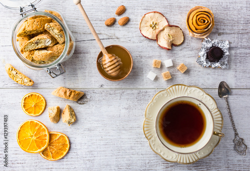  Almond cookies and cup of tea. Top view.